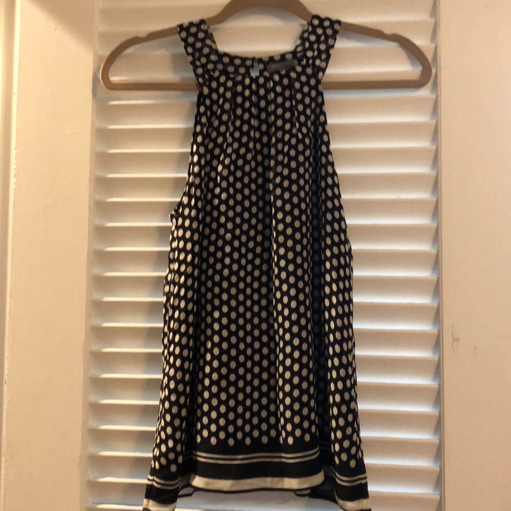 Ann Taylor black and white silk sleeveless top.
